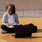 Student using AI tools on a laptop for studying