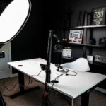 Content creator using free AI tools at a desk setup